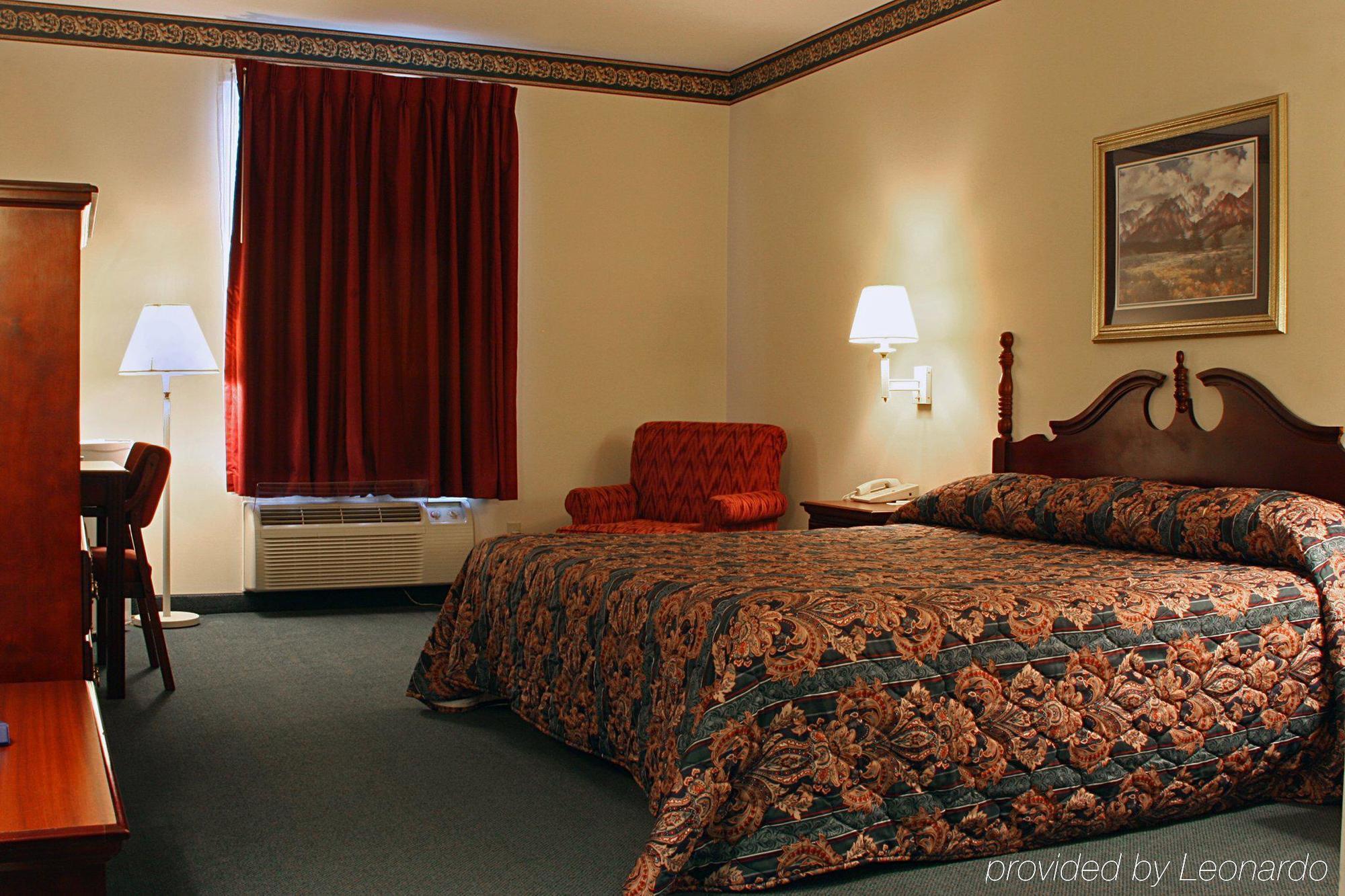 Collins Inn & Suites Quarto foto